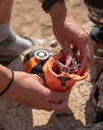 Jetboil MightyMo Steel Cooking Stove packaged rock