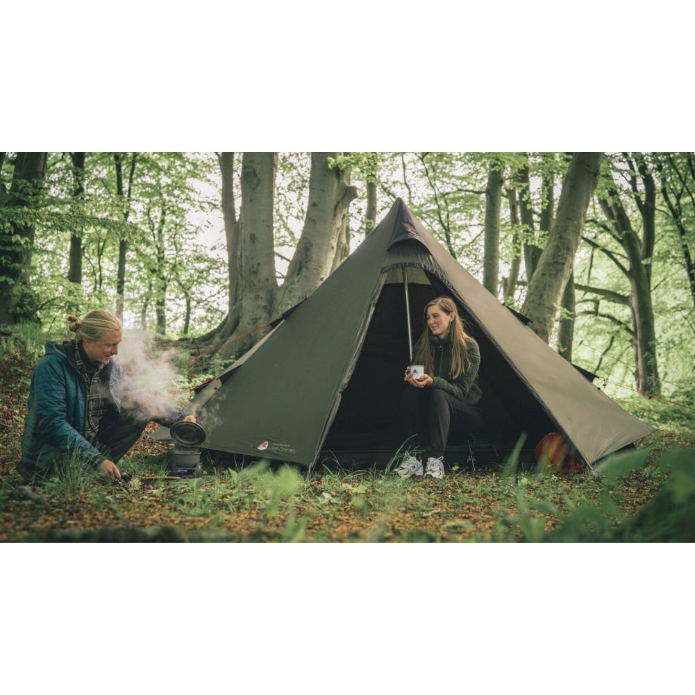 Robens Green Cone PRS Tipi Tent (2024) couple sitting in the woods