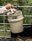 YETI Loadout 5 Gallon Bucket (Tan) put into car