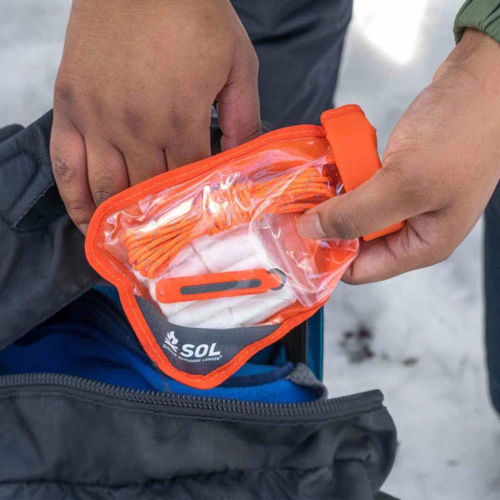 SOL Fire Lite Kit in Dry Bag hand
